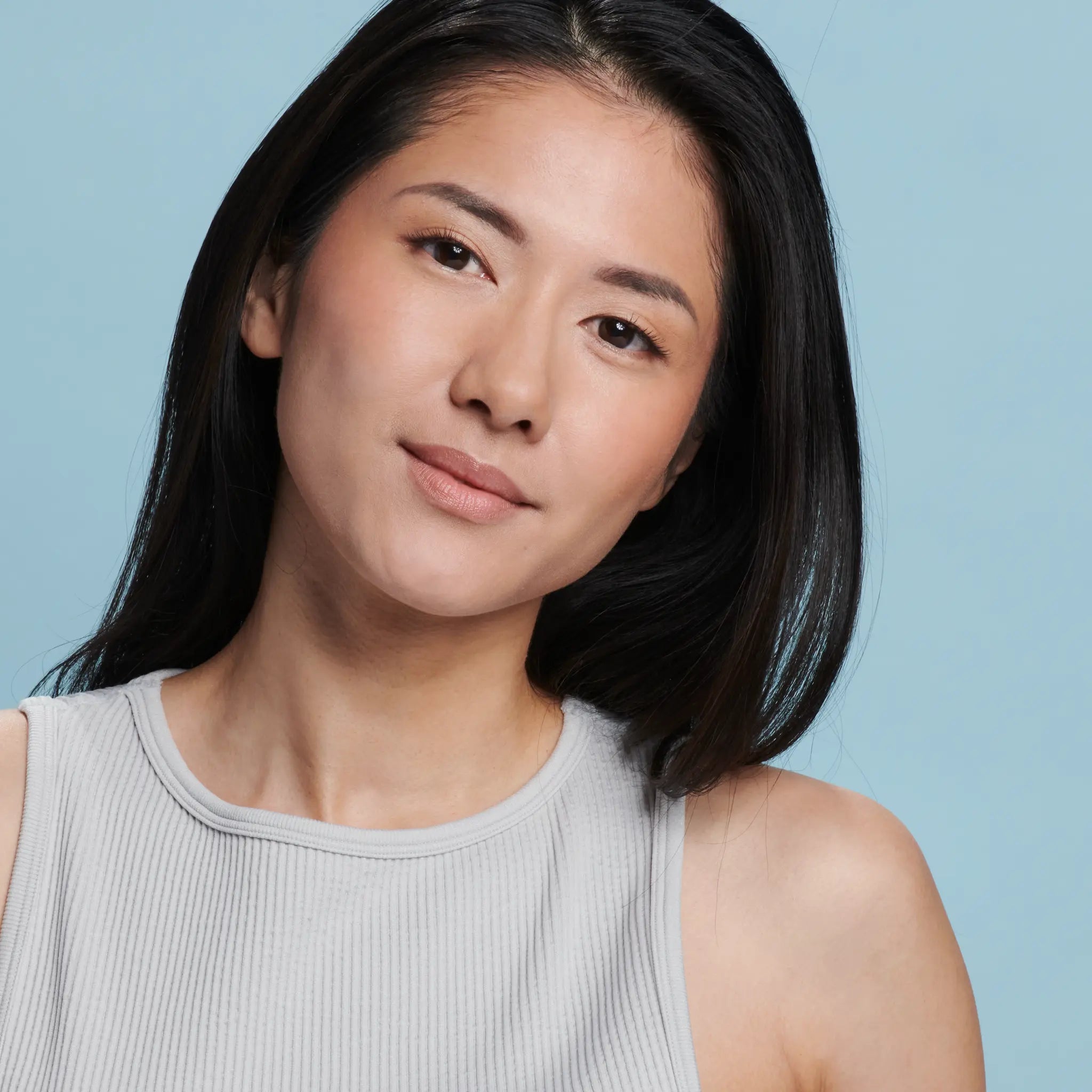 Model wearing Sunforgettable® Total Protection™ Face Shield Matte SPF 50 || all