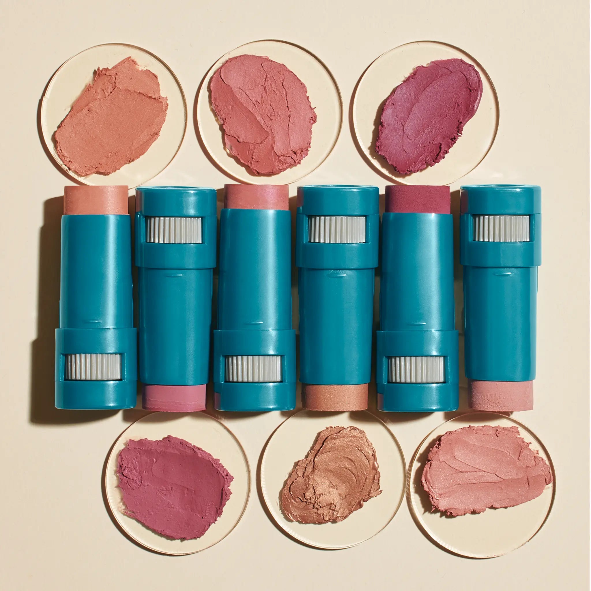 Color Balms SPF 50: top left to right: golden hour, pink sky, violet haze; bottom left to right: berry, bronze, blush || all